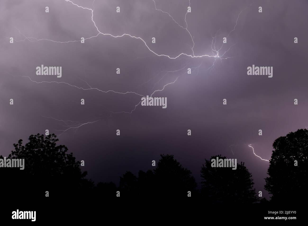 Early summer lightning storm breaks across the sky in Arkansas Stock Photo