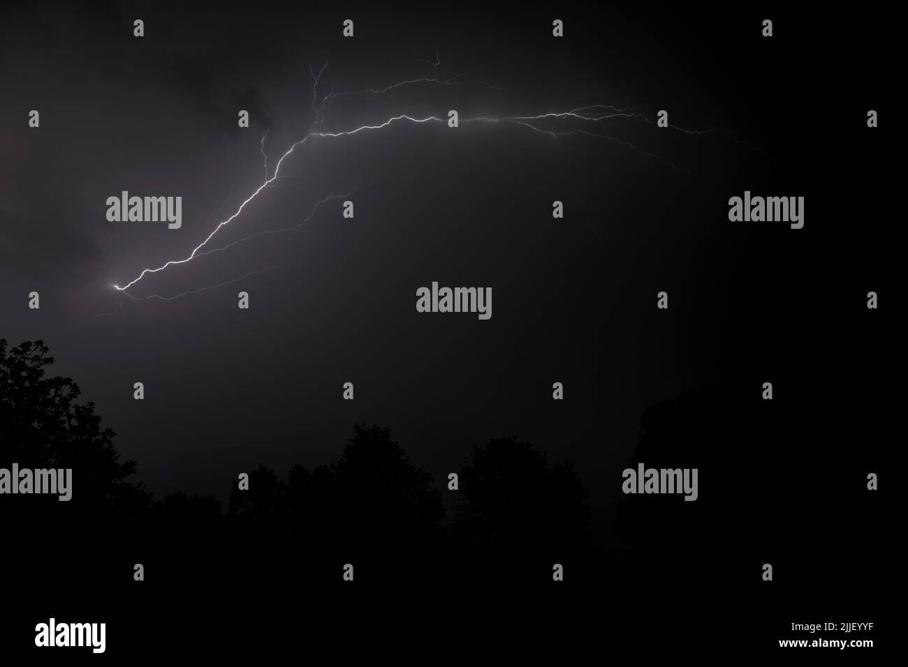 Early summer lightning storm breaks across the sky in Arkansas Stock Photo