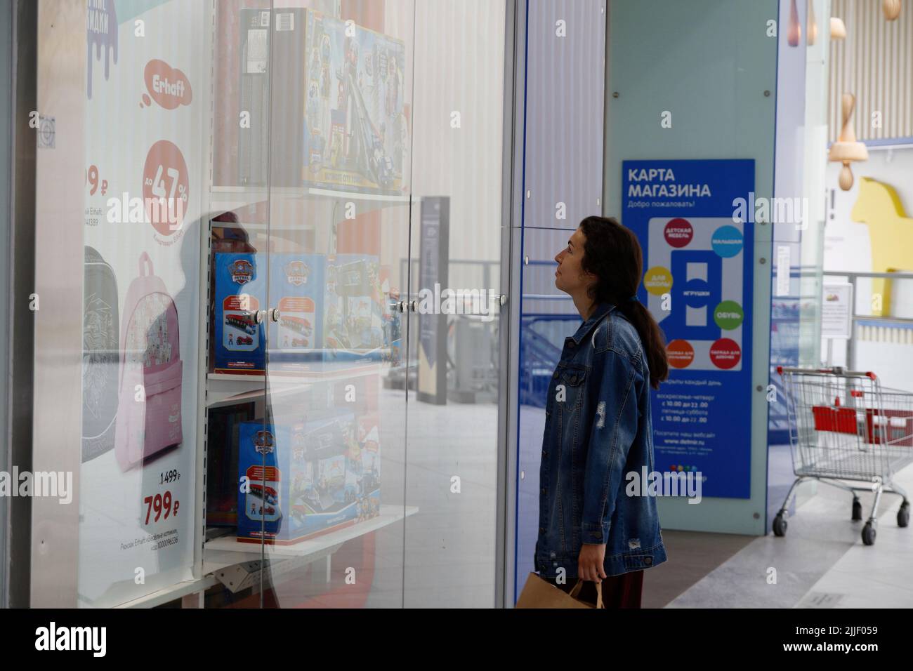 Saint Petersburg, Russia. 25th July, 2022. A visitor chooses stores for