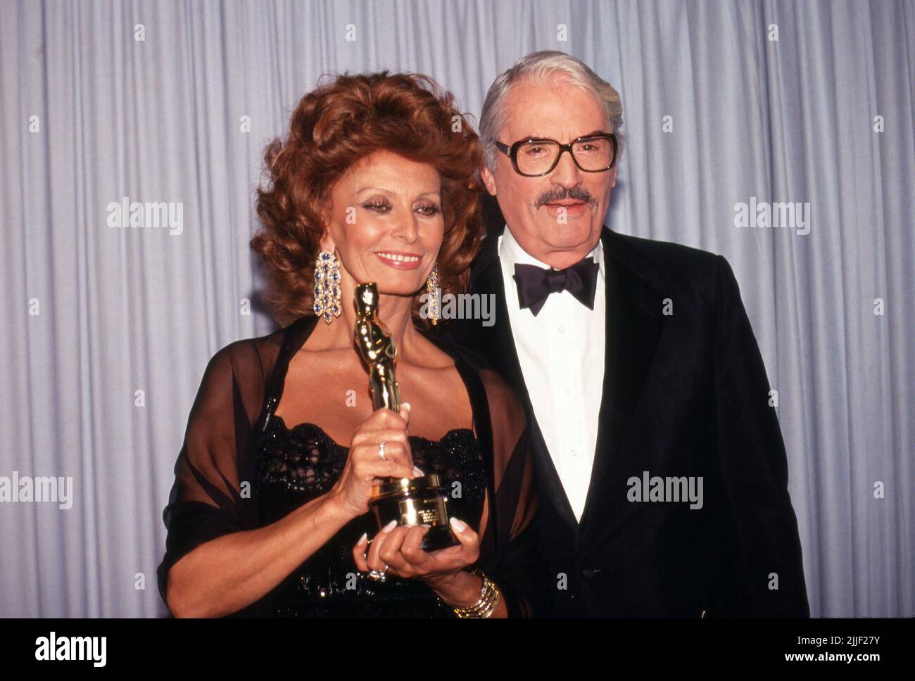 Sophia Loren and Gregory Peck at the 63rd Academy Awards ceremony on ...