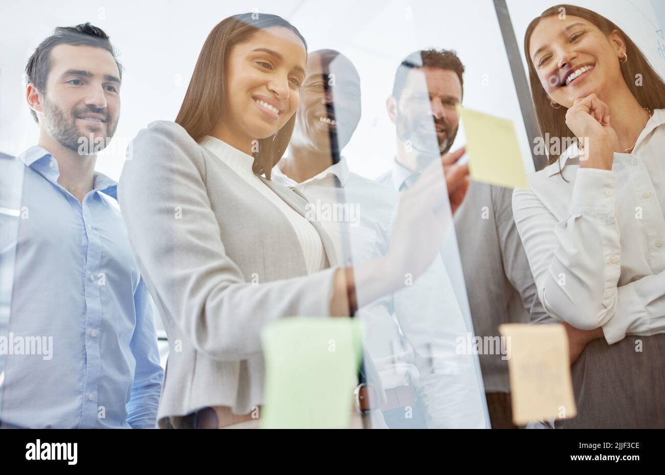 Their brainstorming sessions always go well. a group of businesspeople ...