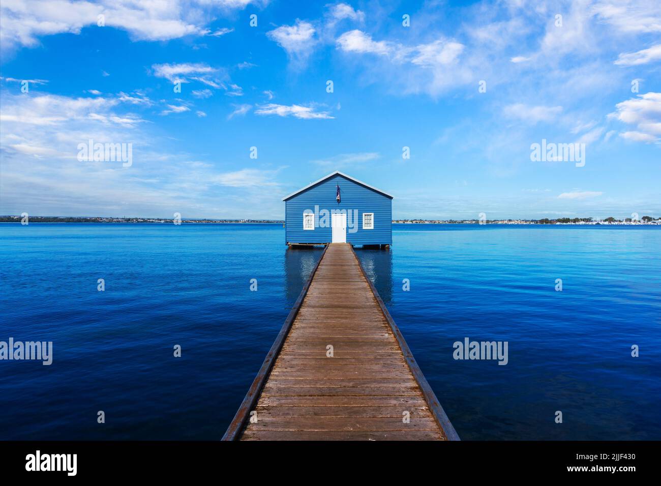 Charming blue boathouse at the end of a pier in Crawley, Western Australia. Built in the 1930s, the tourist popular boatshed is one of the most photog Stock Photo
