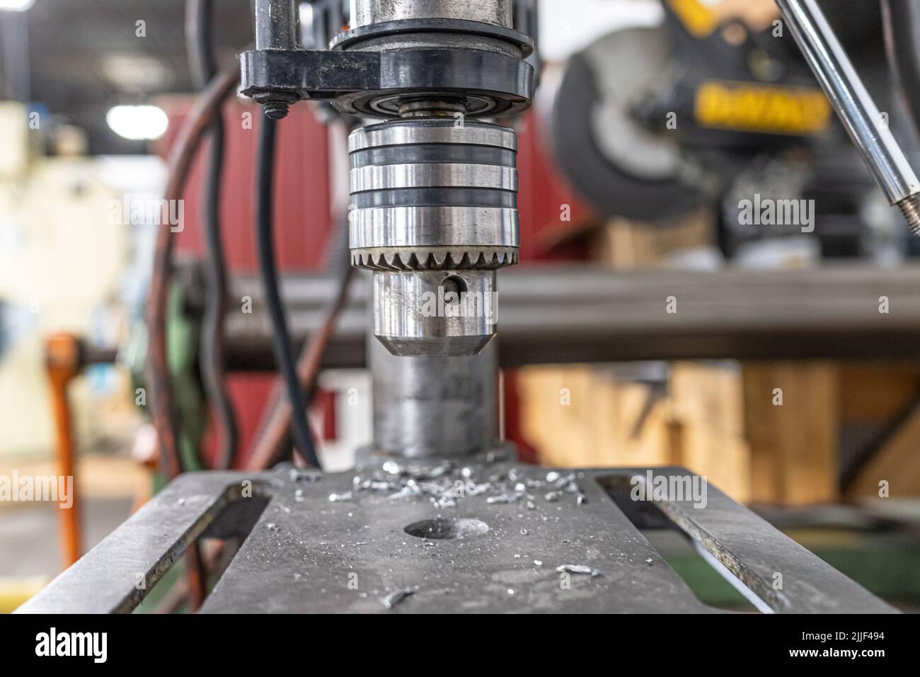 metal punch with metal shavings in a factory Stock Photo Alamy