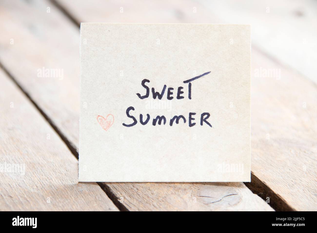 Sweet summer concept. A tag with the inscription. Stock Photo