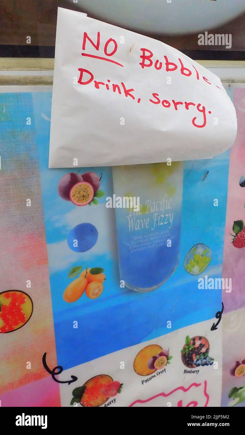 On a food van, a hand written apologetic sign tells customers they're out of bubble tea. Stock Photo