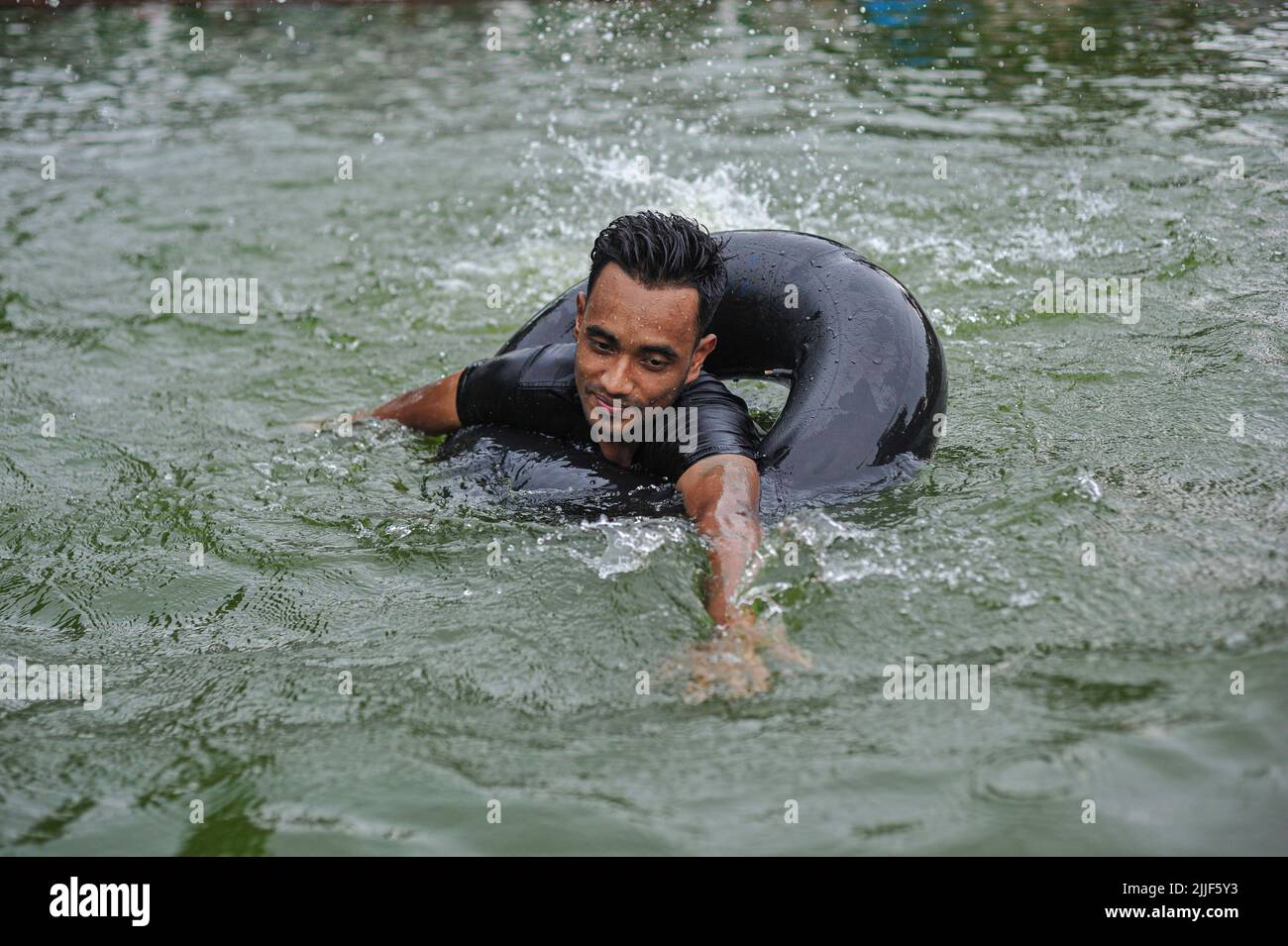 Children swimming in a pond. Drowning is one of the leading causes of