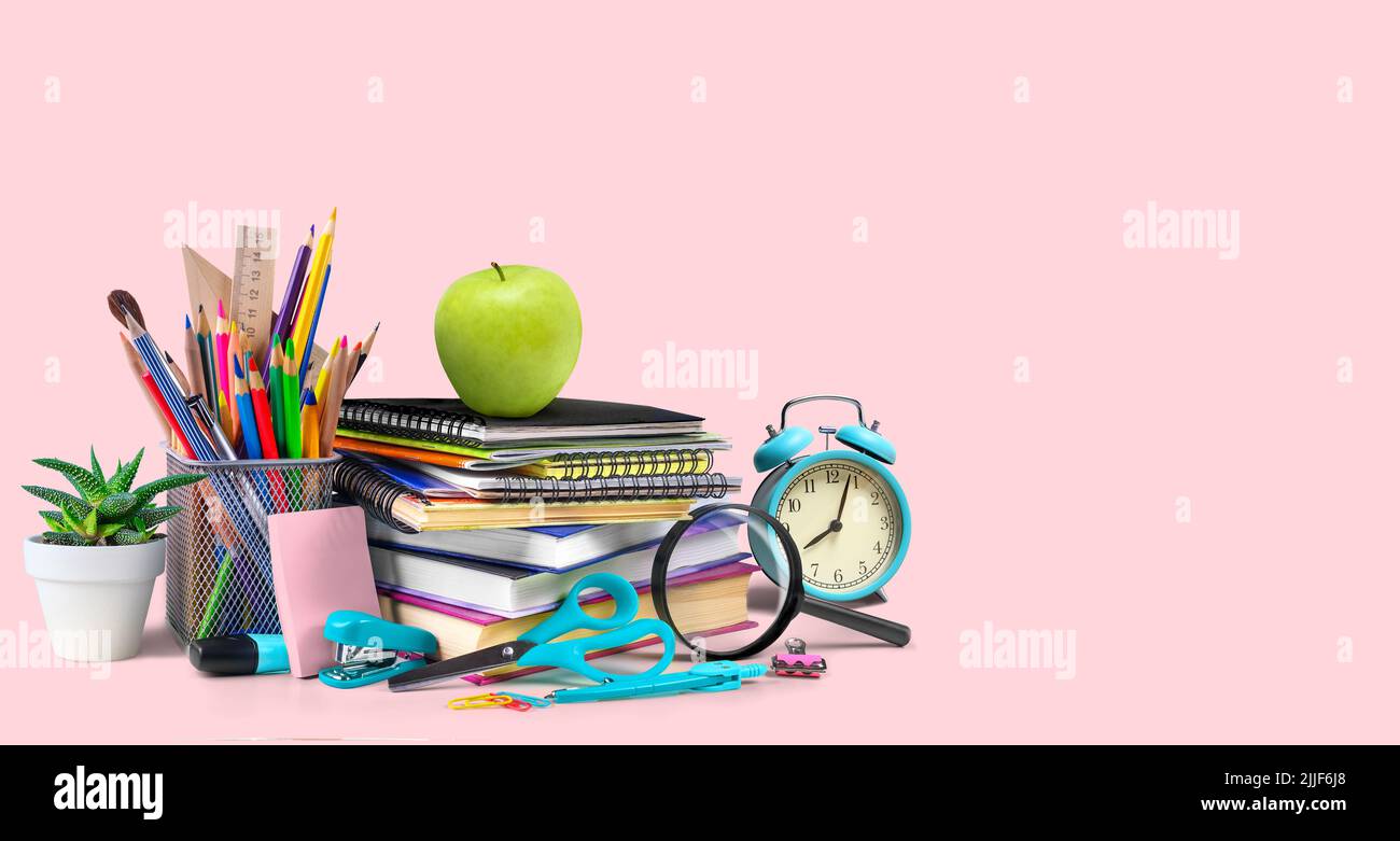 School supplies composition isolated on a pink background Stock Photo