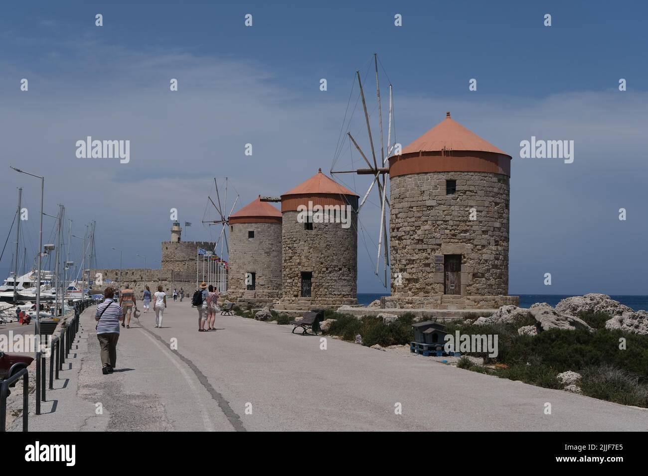The Windmills of Mandraki in Mandraki Harbour on the island of Rhodes in Greece Stock Photo