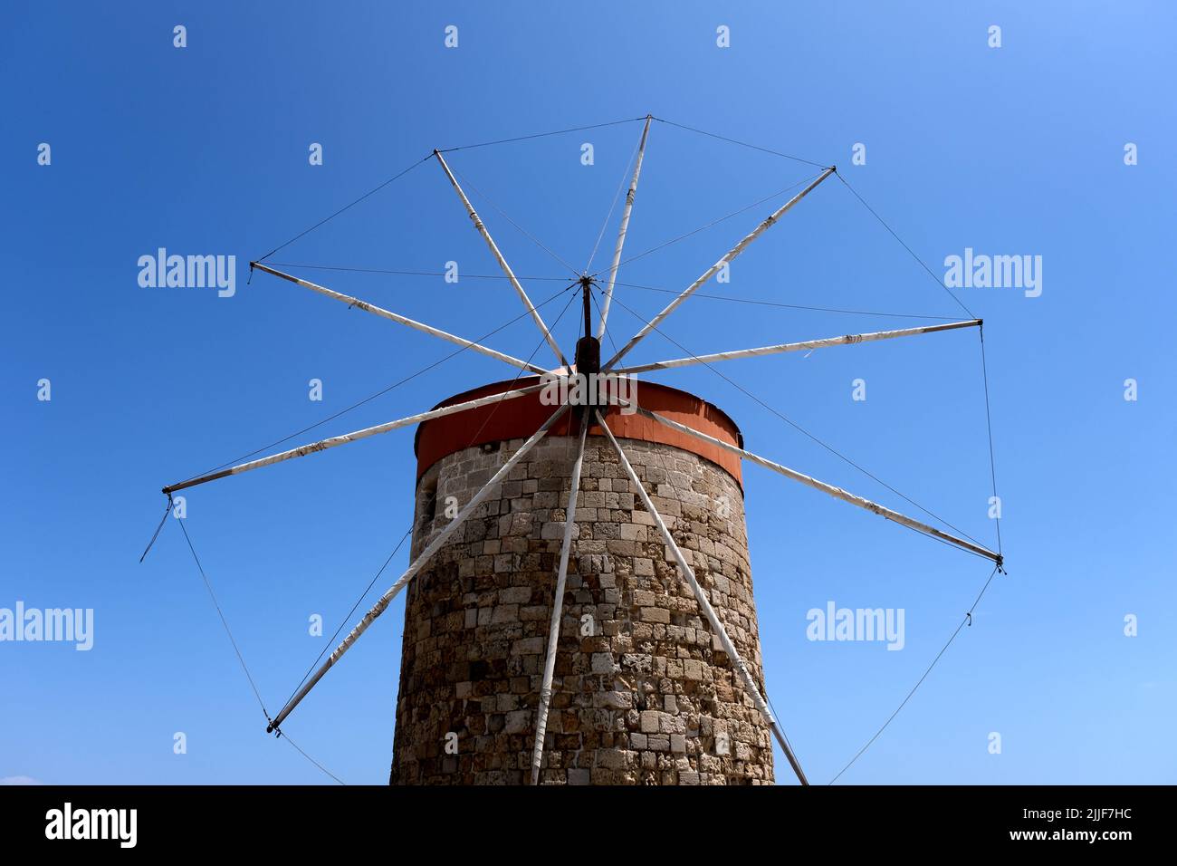 One of the Windmills of Mandraki in Mandraki Harbour on the island of Rhodes in Greece Stock Photo