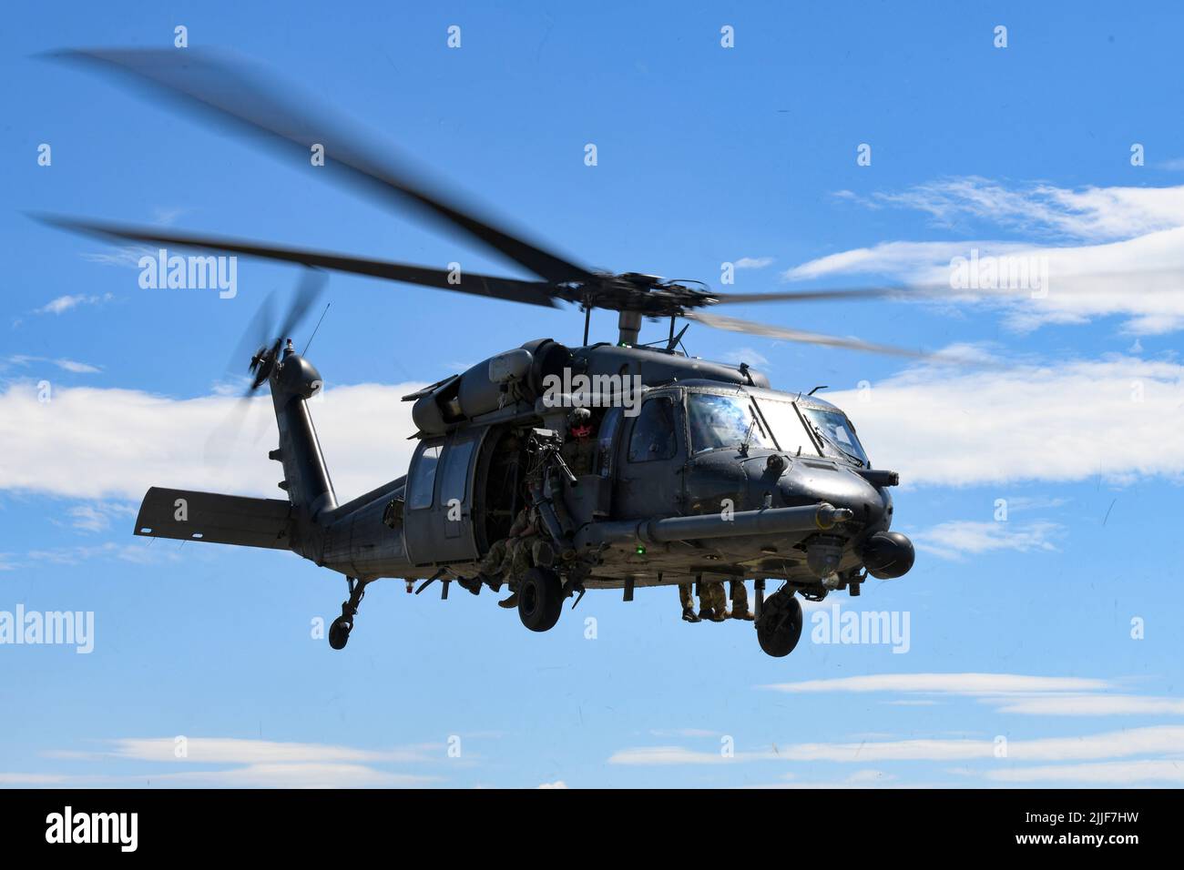 A U.S. Air Force HH-60G Pave Hawk from the 56th Rescue Generation Squadron flys over a training range near Pápa Air Base, Hungary, July 14, 2022, during exercise Jolly Vihar. Jolly Vihar marks the first time U.S. HH-60Gs have operated out of Pápa AB and incorporated bilateral ground and air operations. (U.S. Air Force photo by Tech. Sgt. Bethany La Ville) Stock Photo