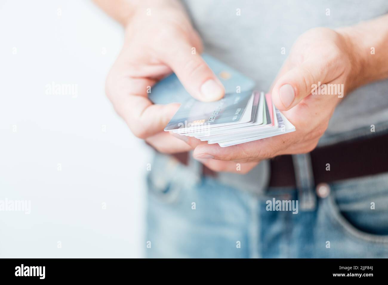 electronic money transactions man hold credit card Stock Photo