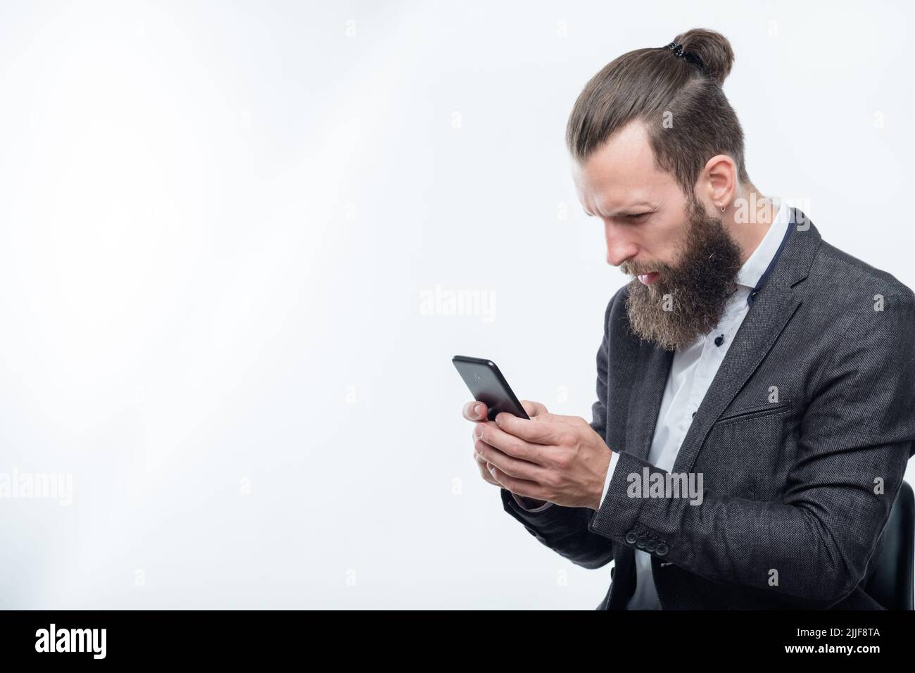 confused-man-reading-phone-bad-news-shock-network-stock-photo-alamy