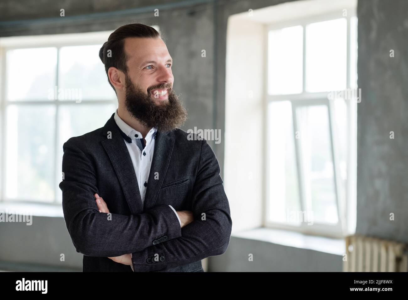 smiling business man arm crossed office dress code Stock Photo