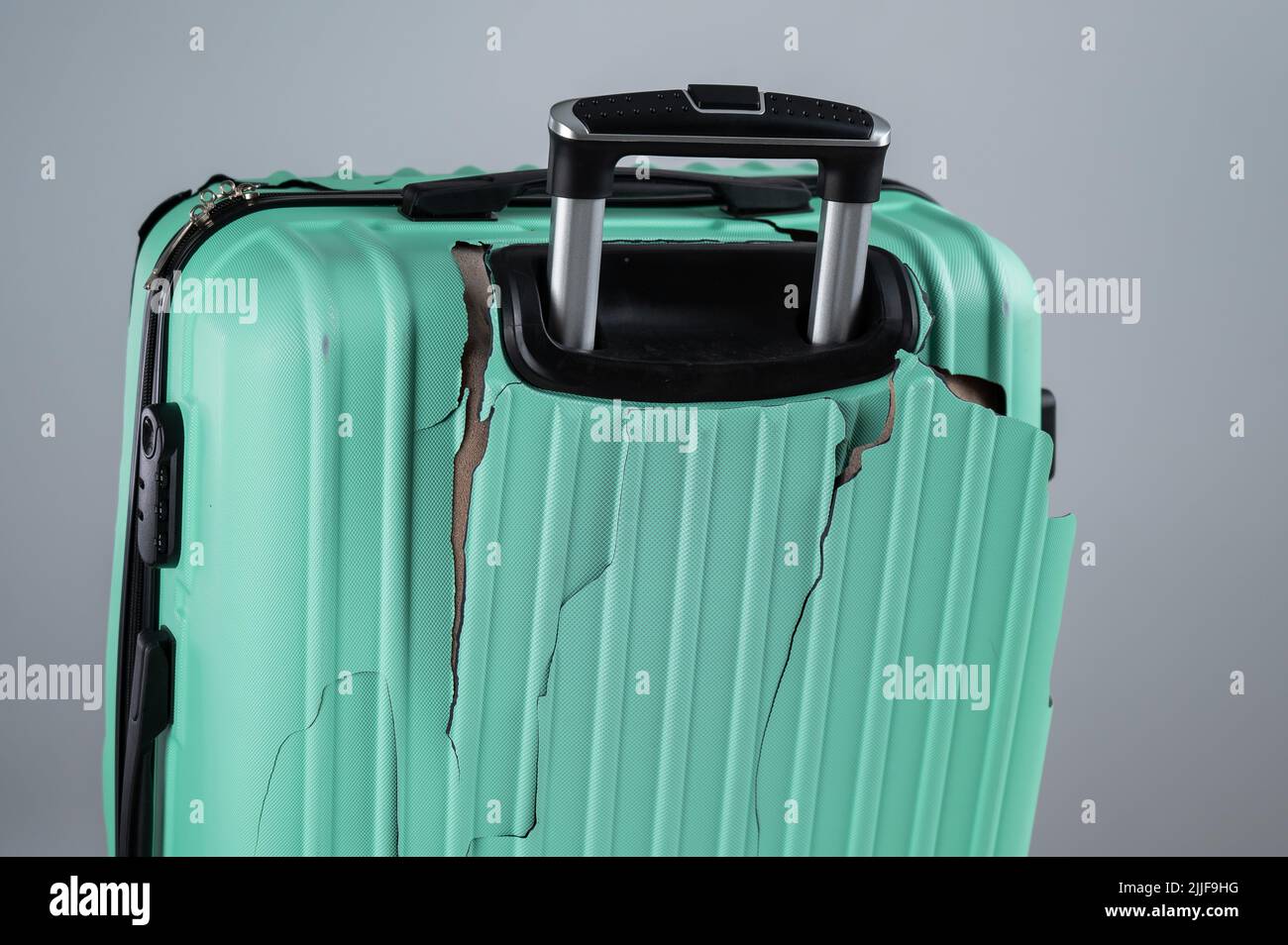 A closeup of a broken plastic suitcase Stock Photo Alamy