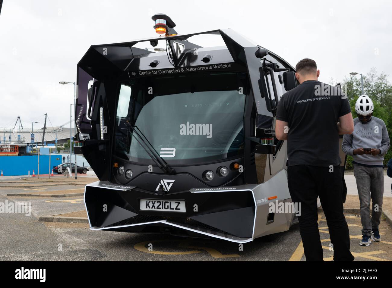 Aurrigo self driving auto-shuttle trial at Etihad Campus. Driverless bus with text Centre for Connected and Autonomous Vehicles. Stock Photo