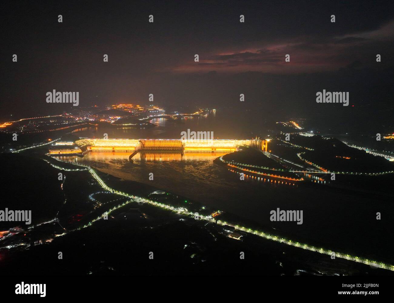 YICHANG, CHINA - JULY 25, 2022 - An aerial photo shows the night view of the Three Gorges Dam in Yichang, Hubei province, China, July 25, 2022. In 201 Stock Photo