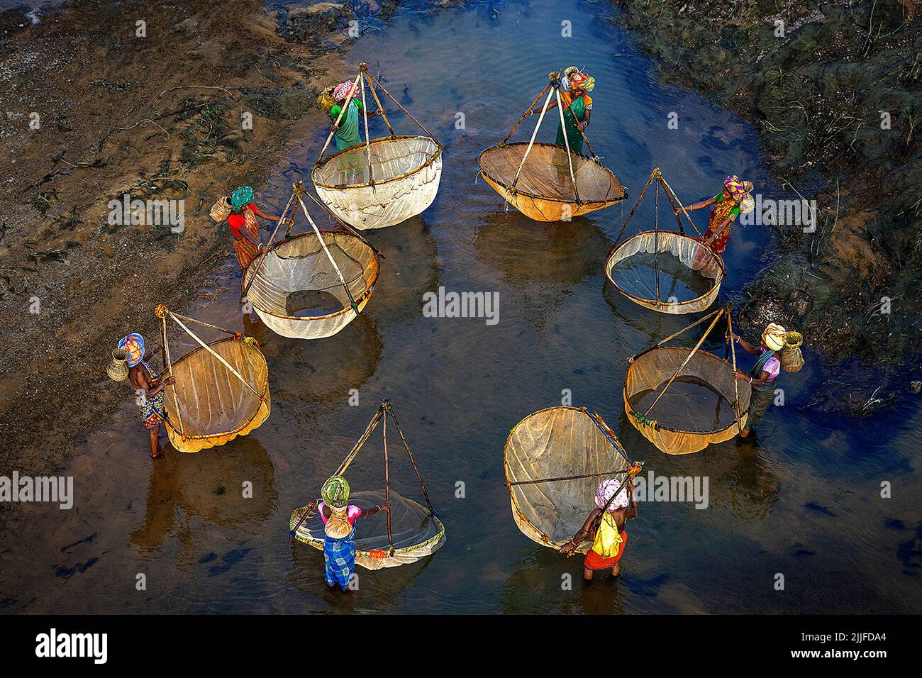 Small fish nets and baskets to catch fish. West Bengal, India: IMAGES show the beautifully intricate fishing practices in India with methods varying d Stock Photo