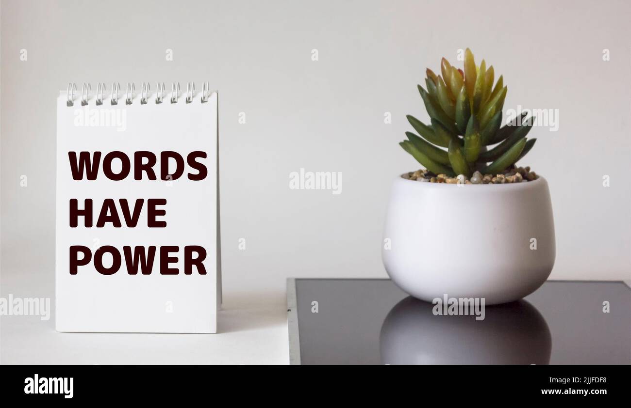 Words have power text in notepad on white background Stock Photo