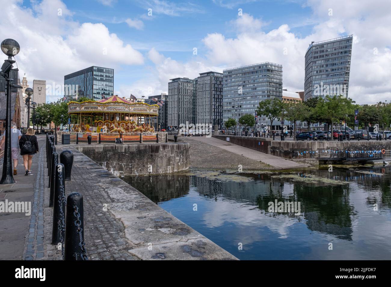 Commercial development, seen reflected in water, from Albert Dock, Liverpool Stock Photo