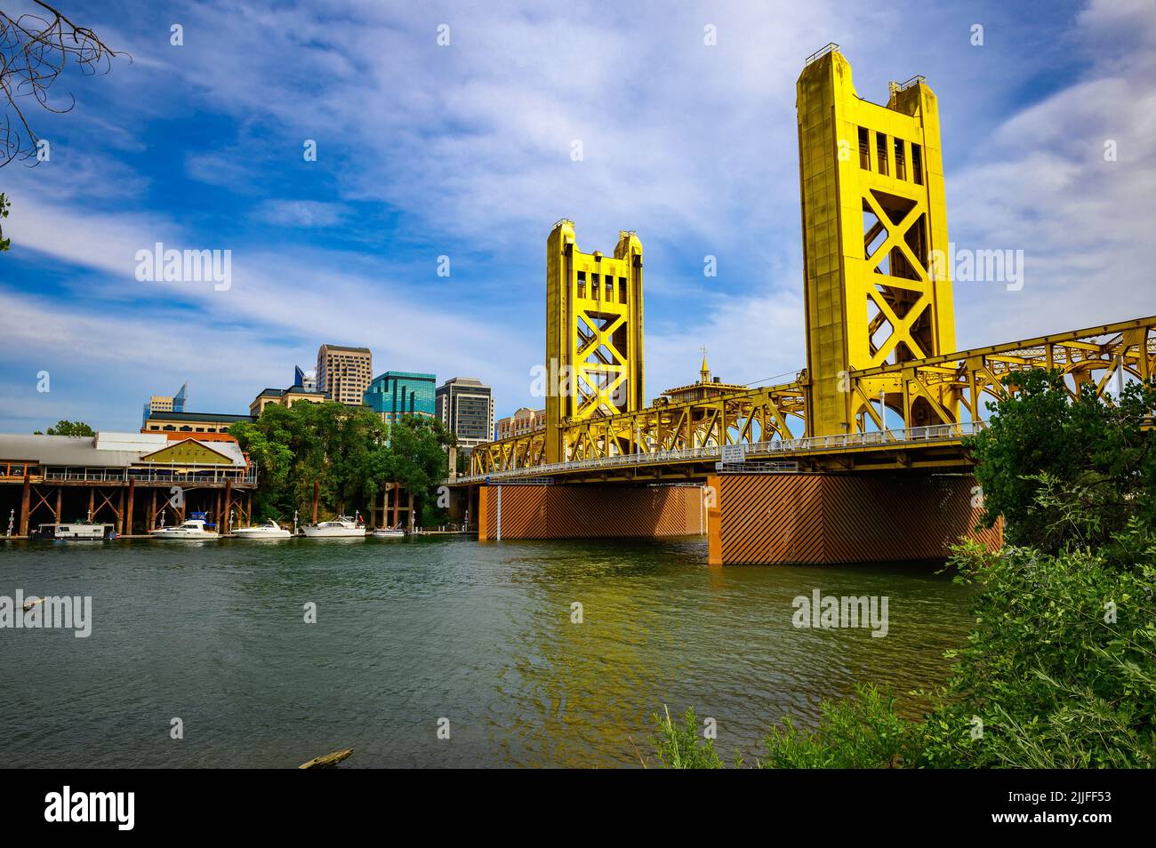 Gold Tower Bridge and Sacramento River in Sacramento, California Stock Photo