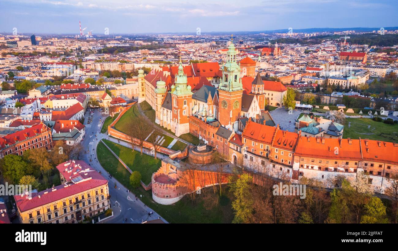 Krakow, Poland. Golden hour aerial drone view of Wawel Hill - Cathedral and Royal Wawel Castle. Vistula riverbank. Stock Photo