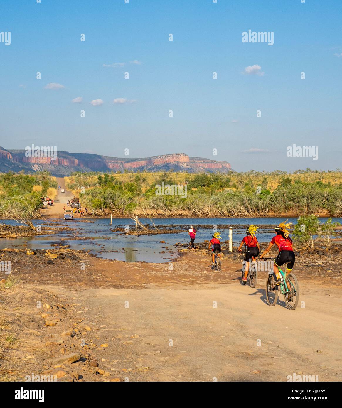 Gibb Challenge 2022 charity bike ride along Gibb River Road crossing the Pentecost River Kimberley Western Australia Stock Photo