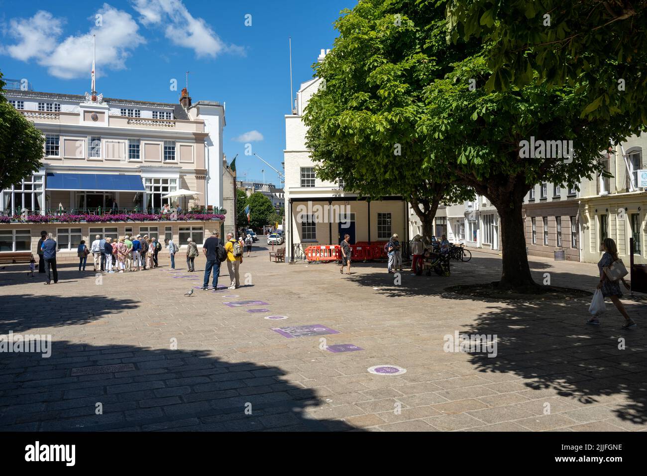 ST HELIER, JERSEY, CHANNEL ISLANDS. JUNE 2022. Tourists and shoppers in St Helier town centre during summer. Stock Photo