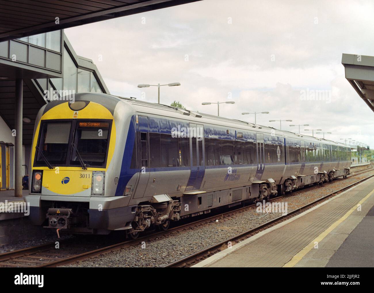 Portadown, UK - 4 July 2022: A passenger train (Class 3000) operated by NIR (Northern Ireland Railways) at Portadown station to Belfast direction. Stock Photo