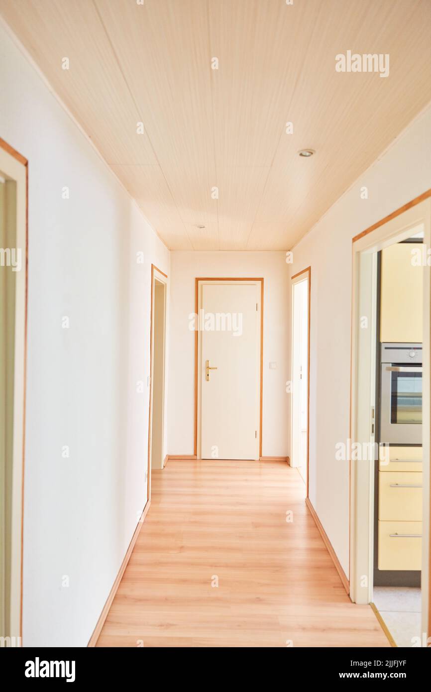 Empty bright narrow hallway or hallway in an apartment Stock Photo