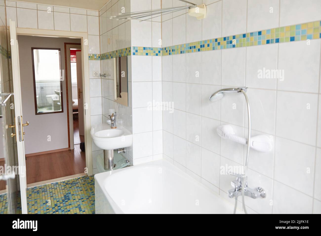 Bathtub and sink in bathroom or bathroom in an apartment Stock Photo