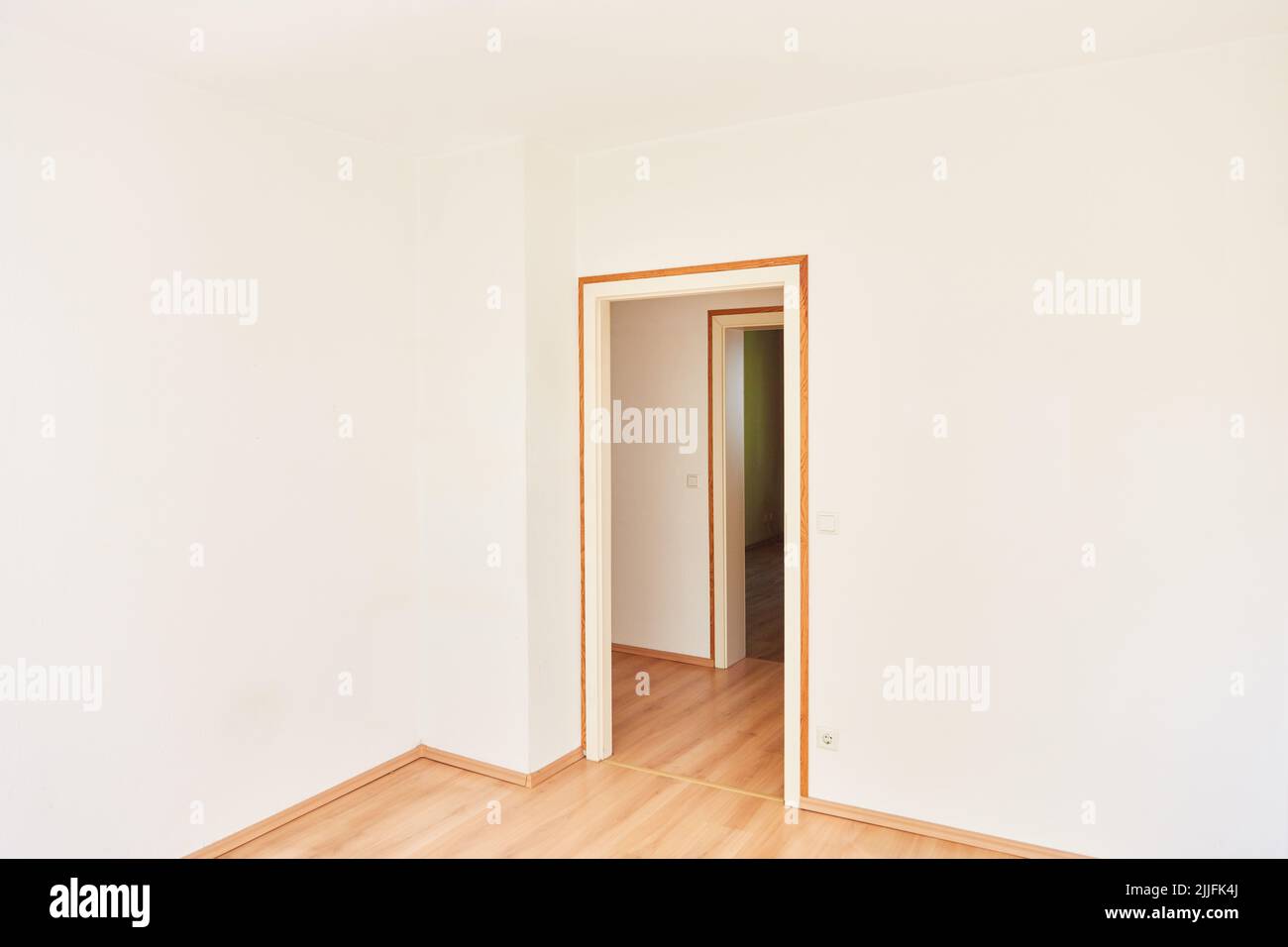 Corner of the room in an empty bright room of an apartment Stock Photo
