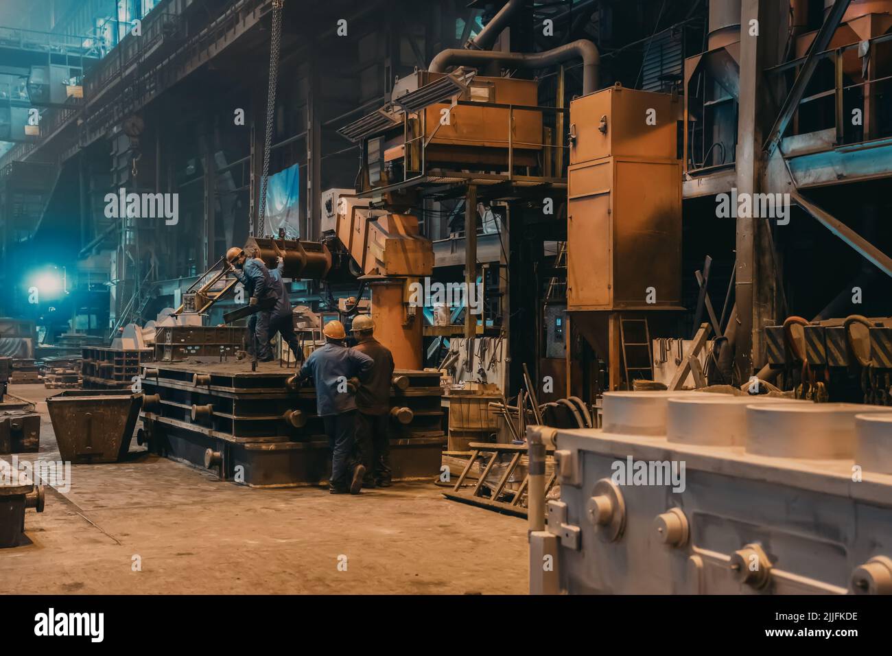 Metallurgical plant large hall inside. Industrial steel production factory. Interior of metallurgical workshop. Heavy industry foundry. Stock Photo