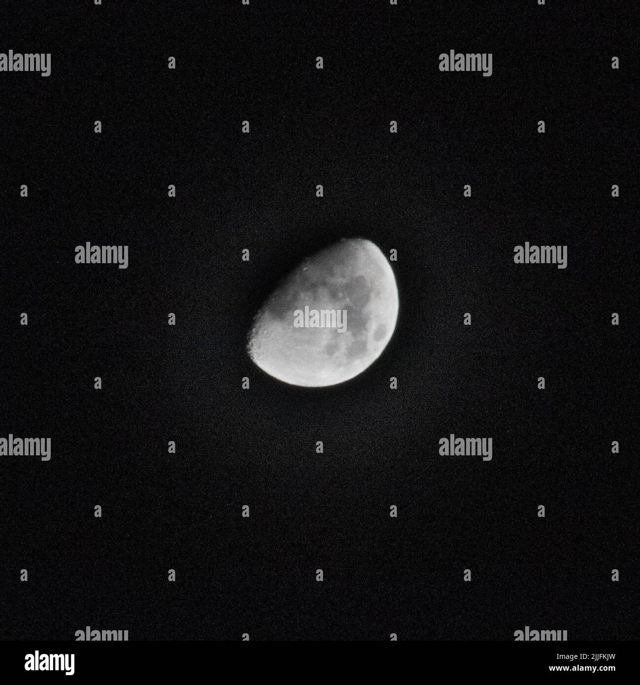 The Waxing Gibbous Moon in a clear dark sky Stock Photo Alamy