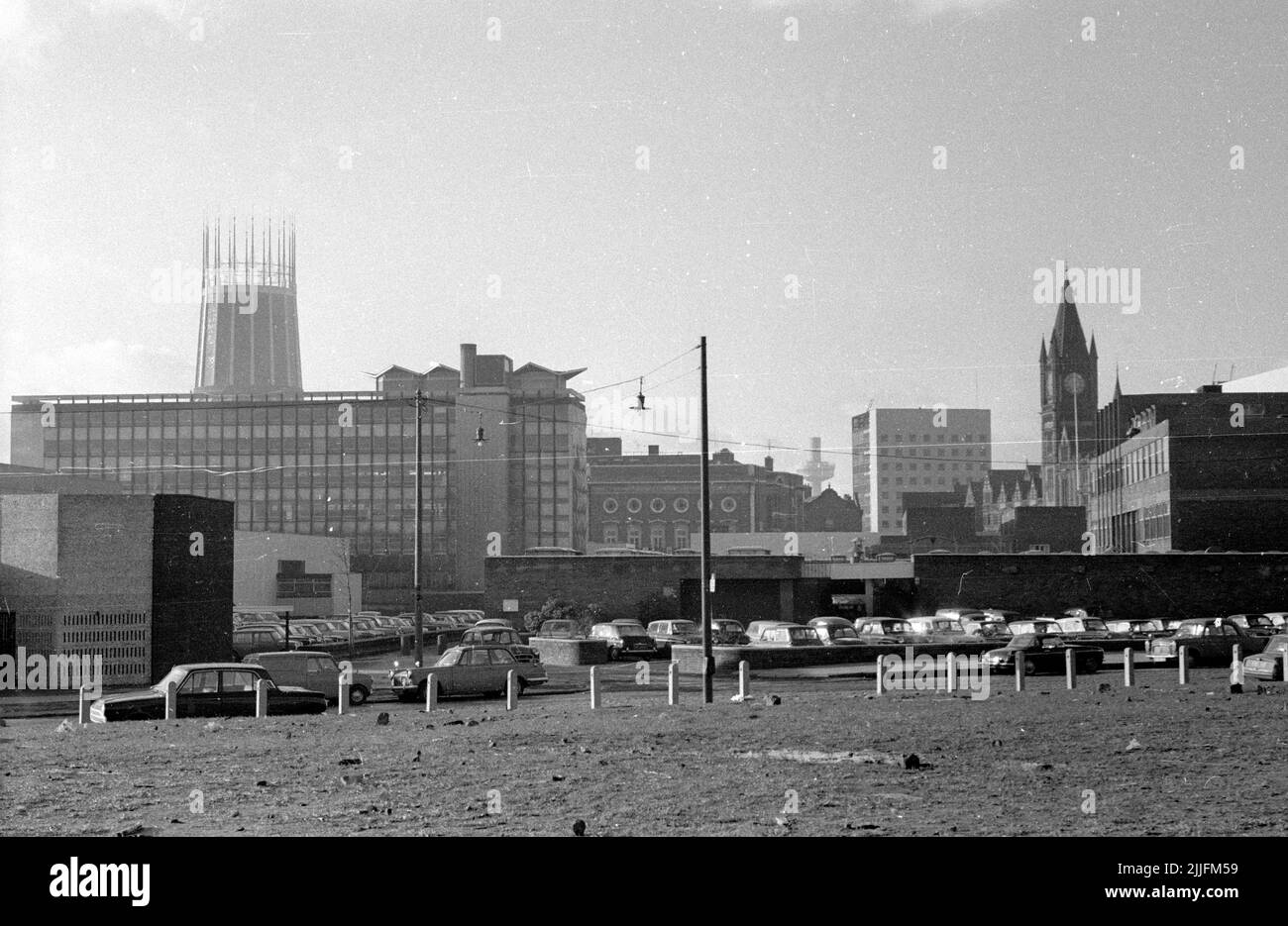 A view from wasteland towards Liverpool University, UK. 1970 Stock Photo
