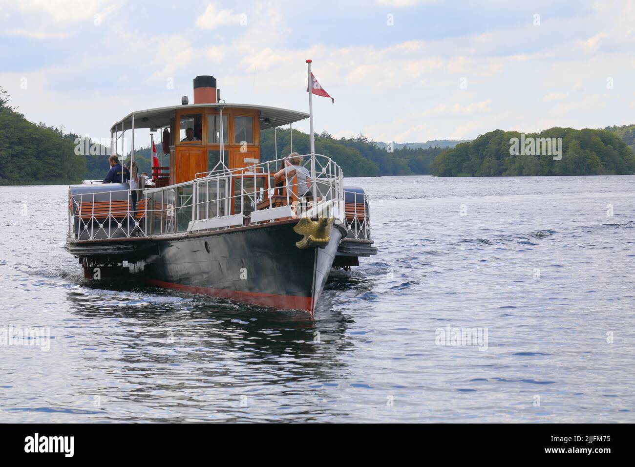 The paddle steamer SS Hjejlen, one of the oldest operational paddle steamers in the world, has been sailing passengers since 1861 at Silkeborg. Stock Photo