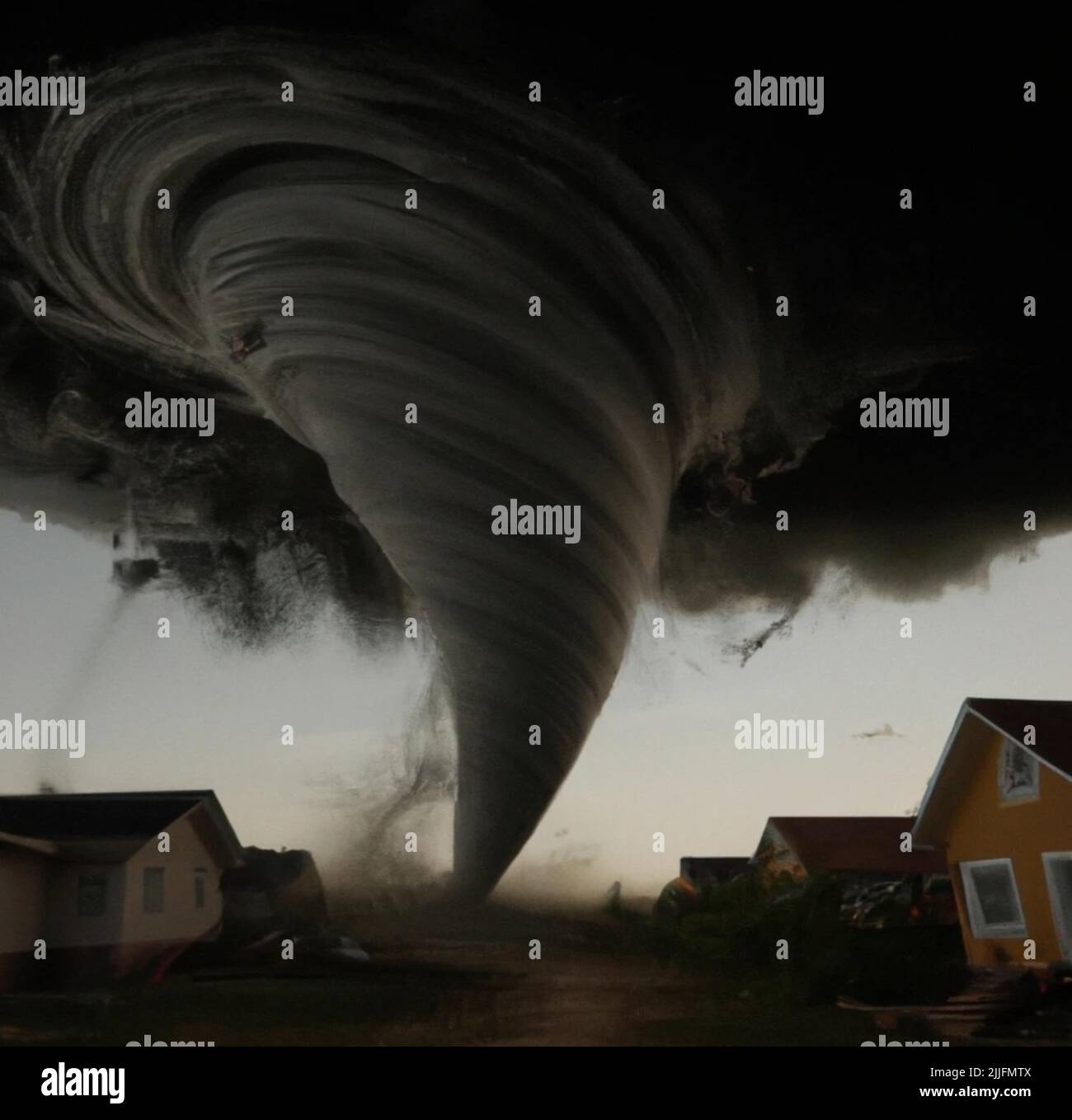A breathtaking view of a tornado among tiny colorful houses Stock Photo ...