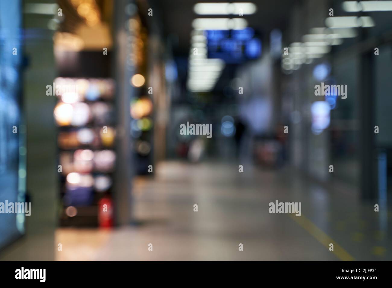 Blurred airport interior background with bokeh and copy space Stock Photo