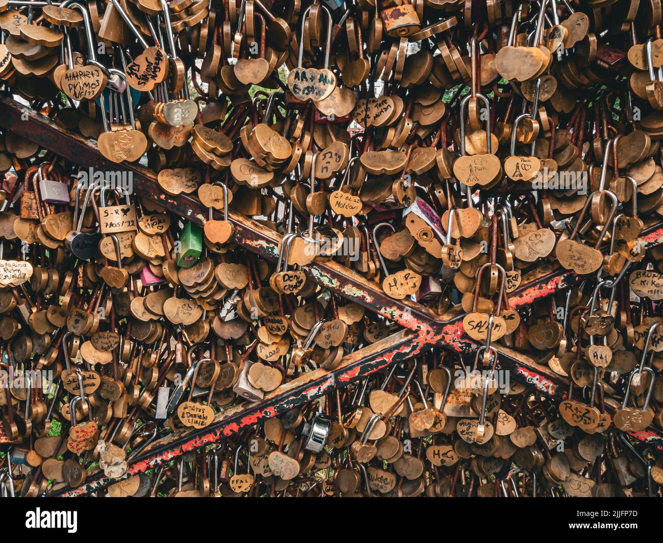 Close shot of lovers' padlocks (love locks) on a bridge over the Seine River in Paris, France. Stock Photo