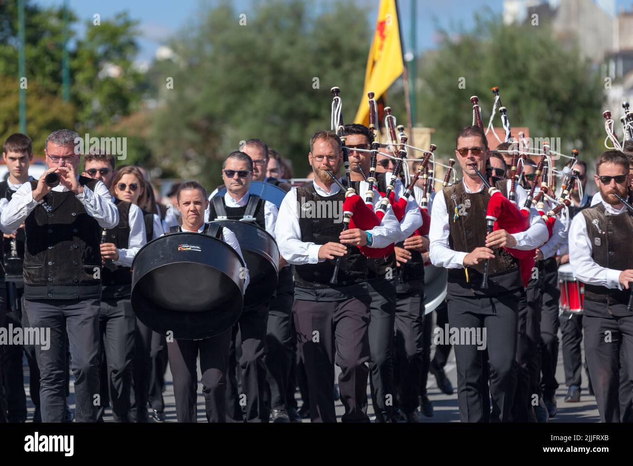 Quimper, France - July 24 2022: Musicians of the Bagad Cap Caval from Plomeur performing during the Cornouaille festival. Stock Photo