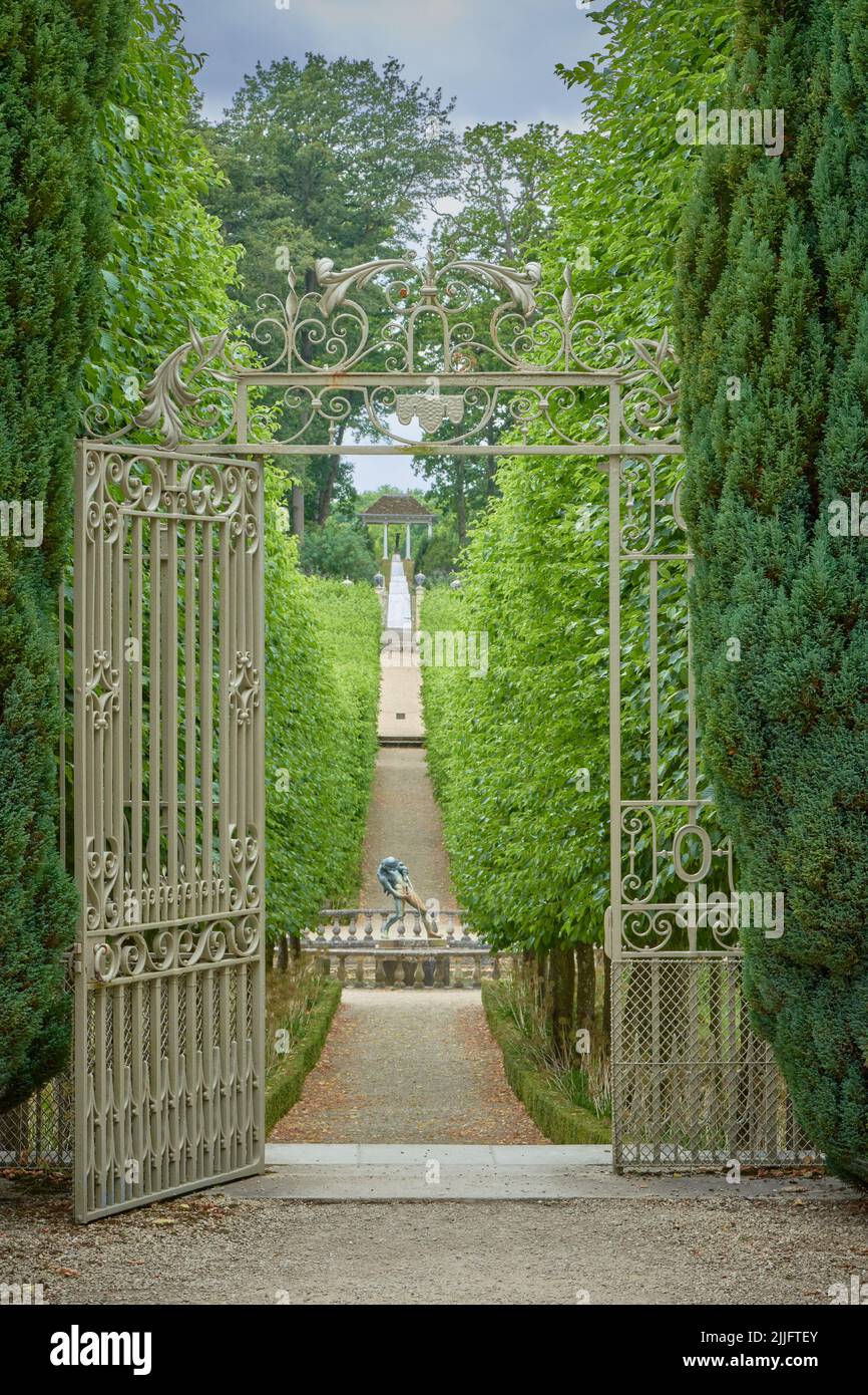 Wrought Iron garden gates leading to a large country garden Stock Photo