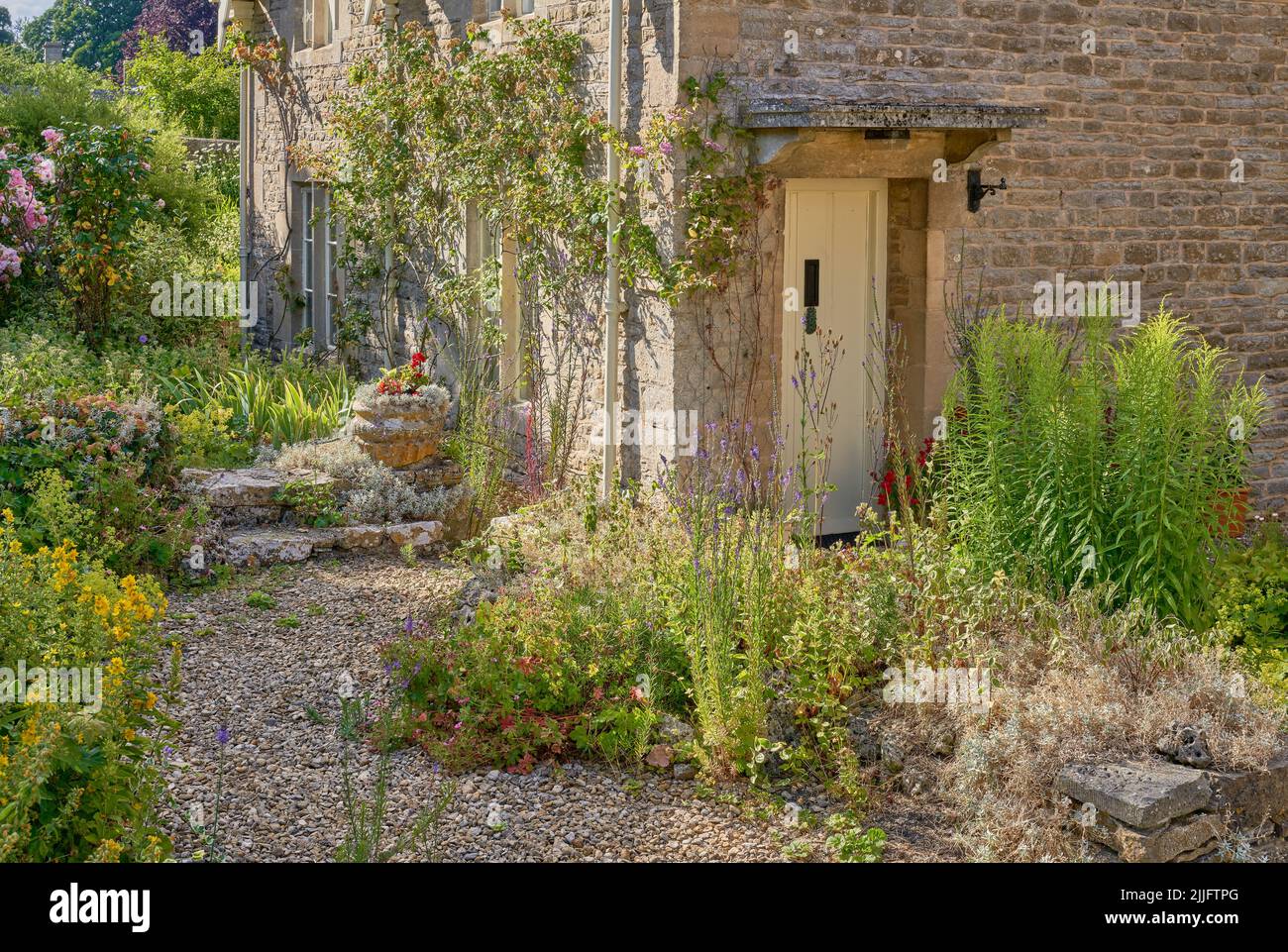Traditional Cotswolds cottage garden Stock Photo