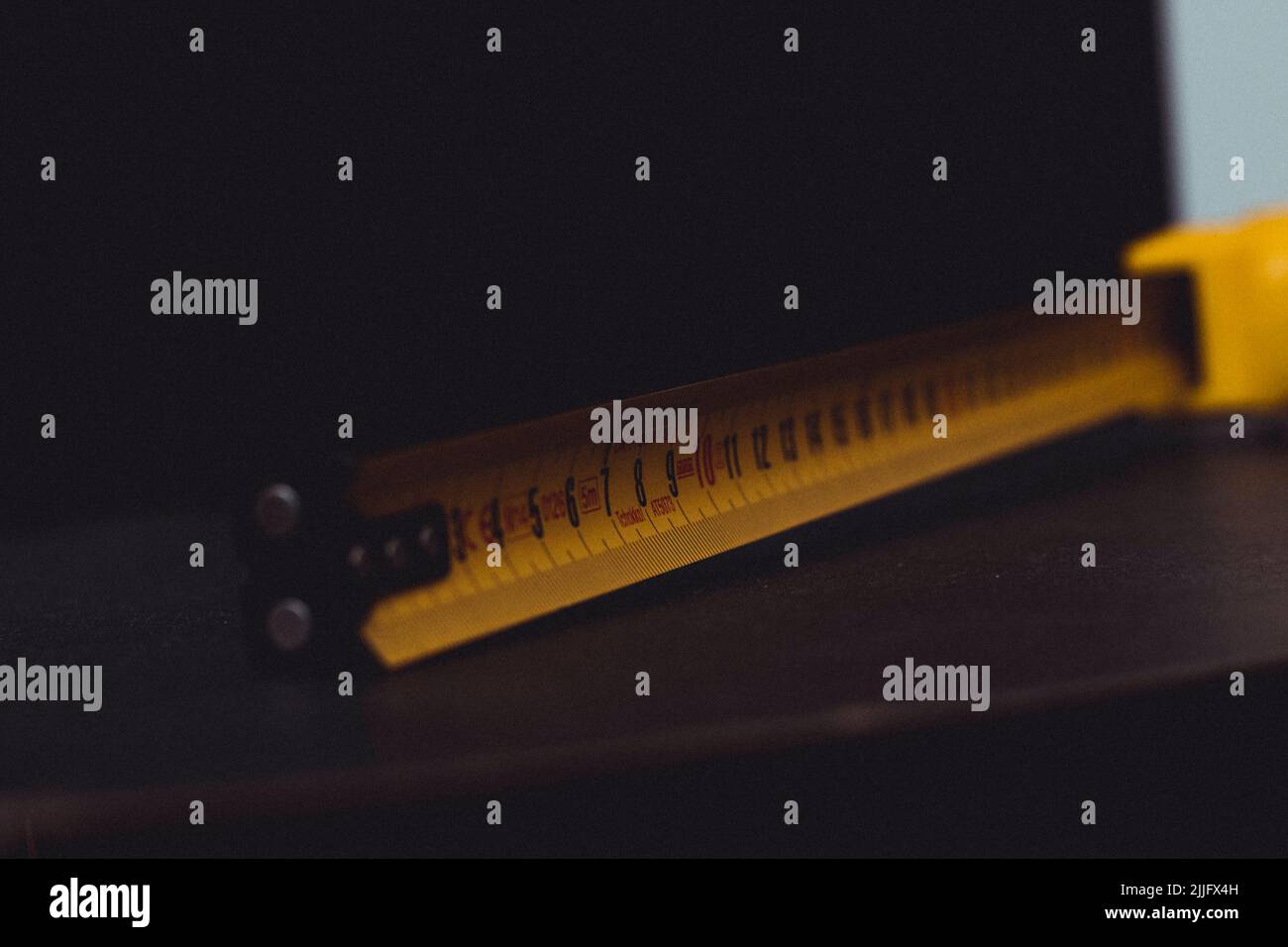 measuring tape on black background Stock Photo