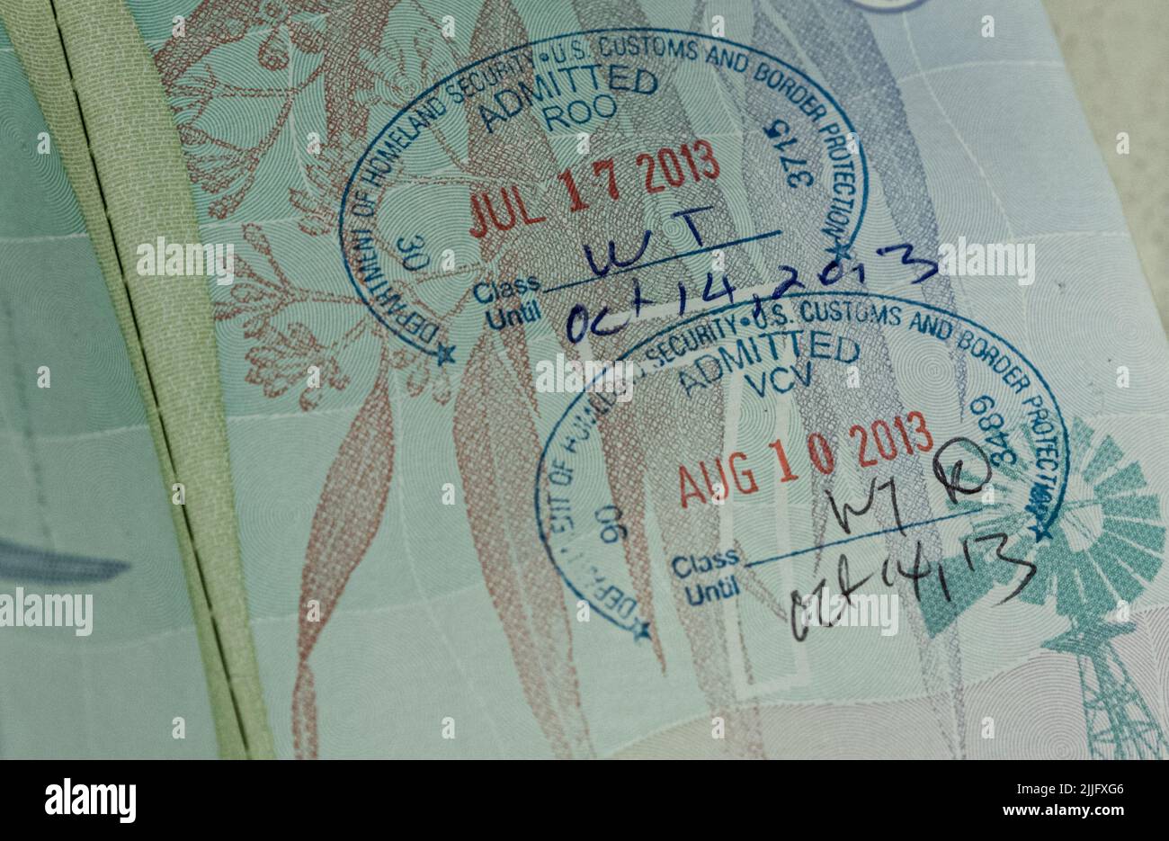 Passport immigration visa stamps entering en exiting Stock Photo
