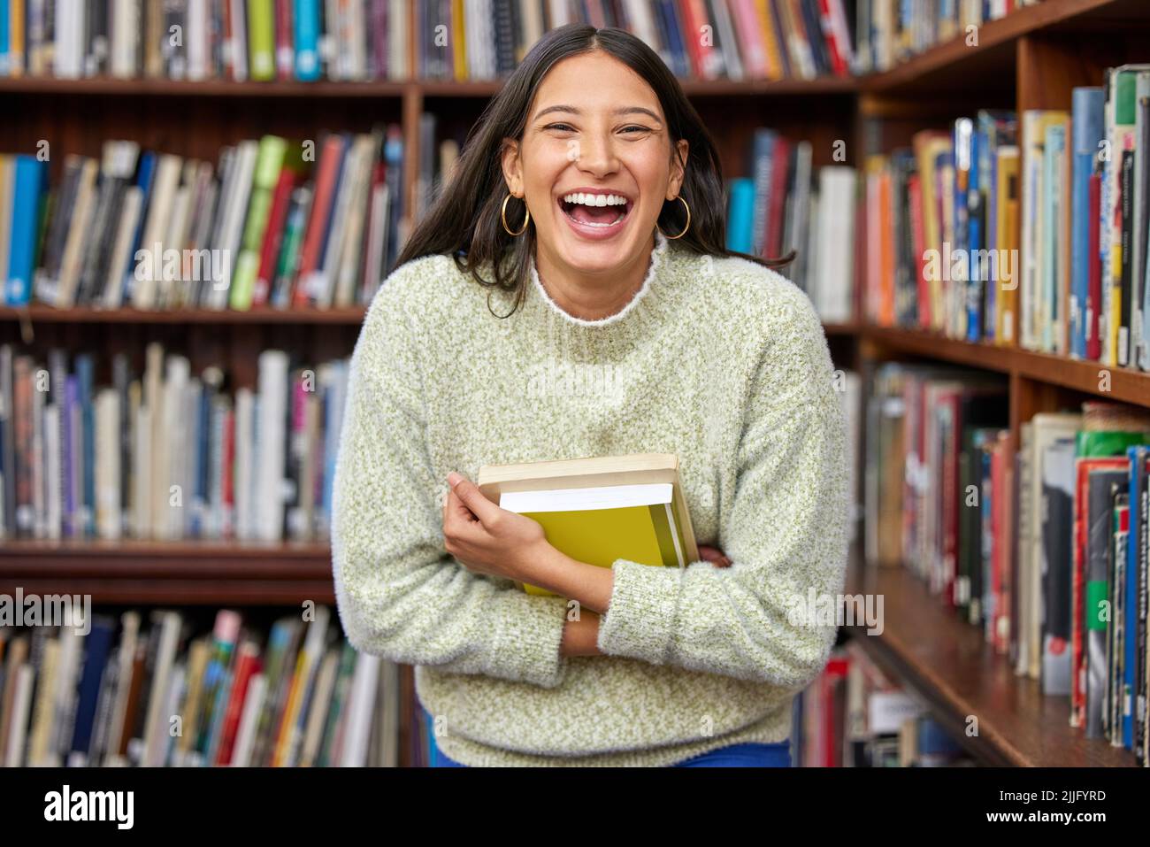 Librarians are tourguides for all of knowledge. a female standing in a