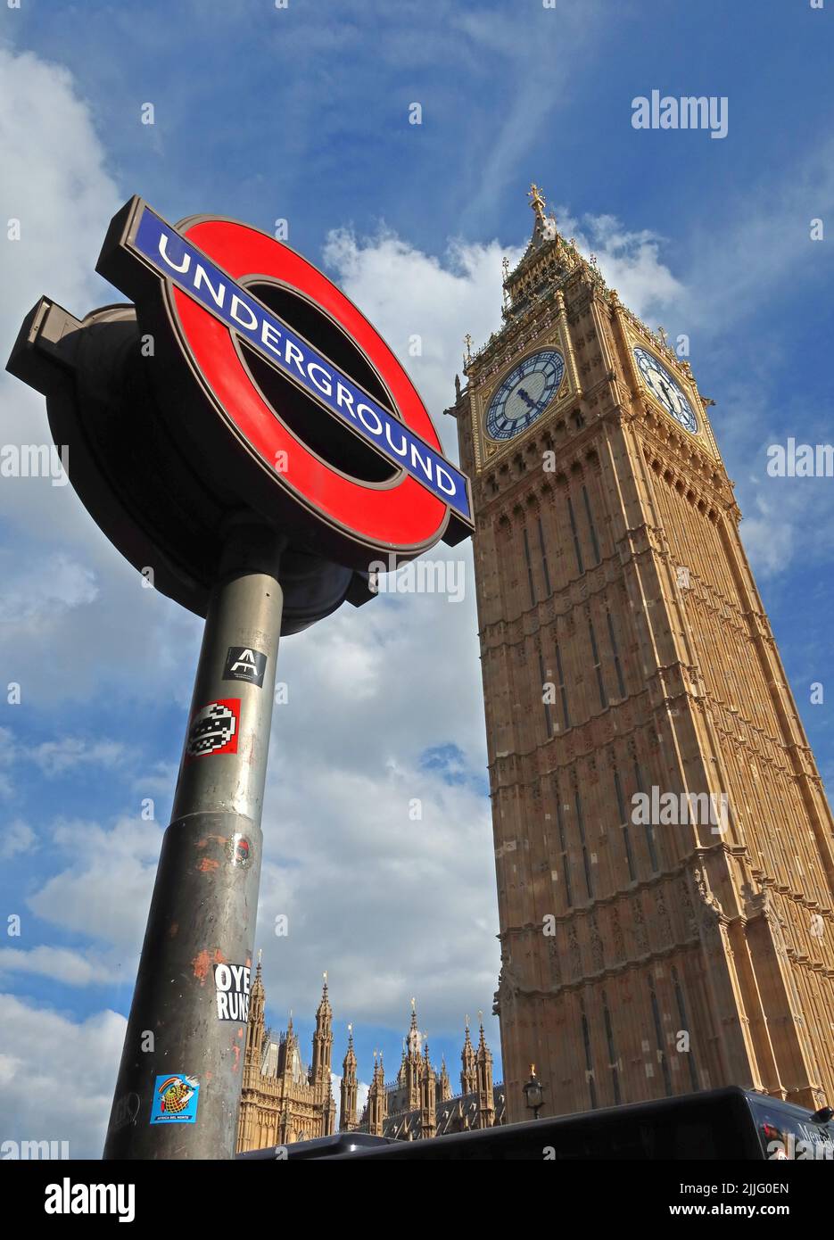 Westminster Underground Sign and new renovated Big Ben & Houses of Parliament, London, England, UK Stock Photo