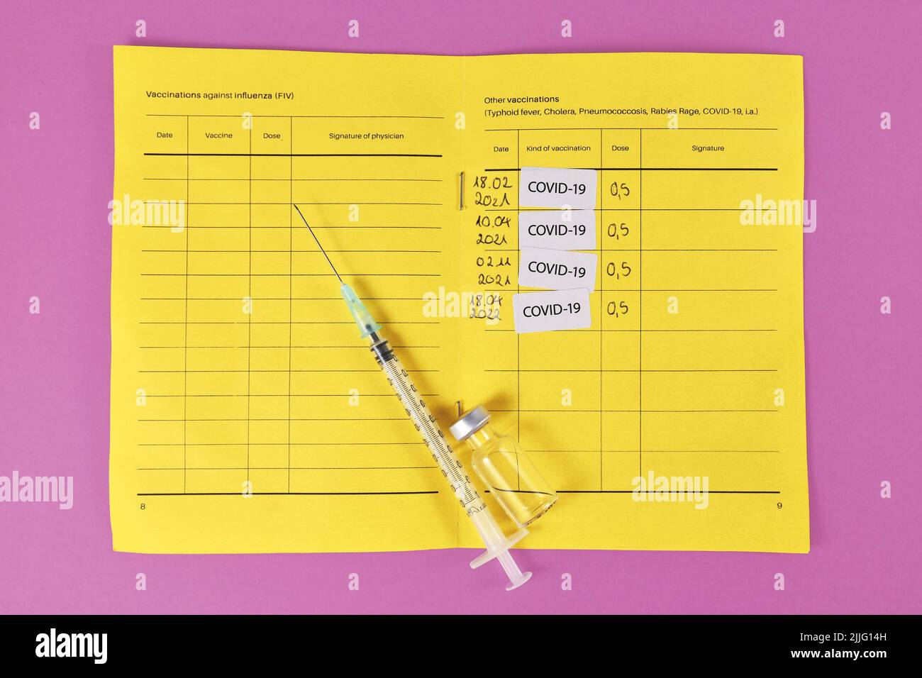 Concept for Corona virus booster vaccination showing vaccine passport with 4 entries Stock Photo