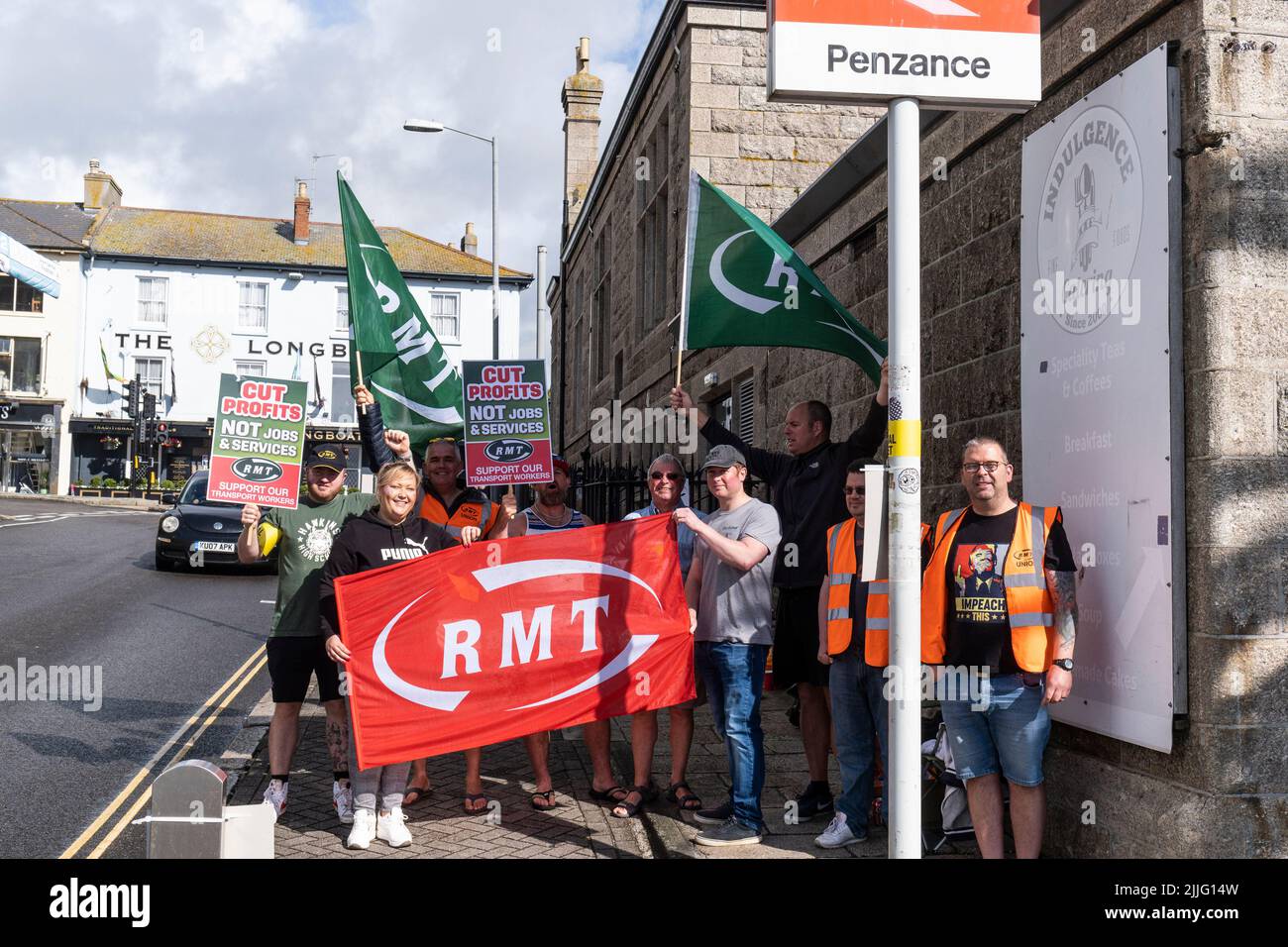 Striking RMT workers on a picket line at Penzance Railway station in Cornwall in the UK. Stock Photo