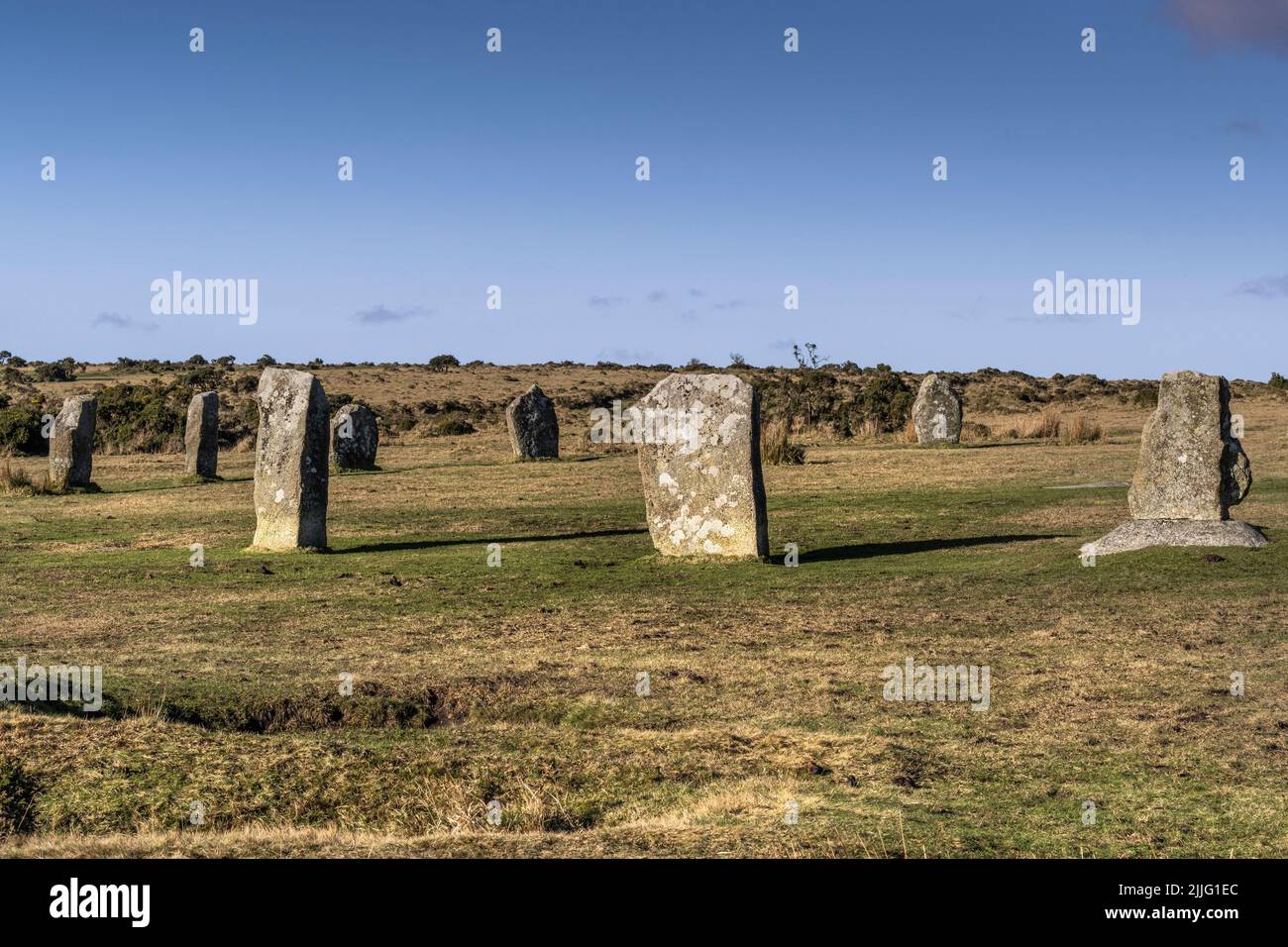 The late Neolithic Early Bronze Age standing stones of the The Hurlers on Craddock Moor on the rugged Bodmin Moor in Cornwall UK. Stock Photo