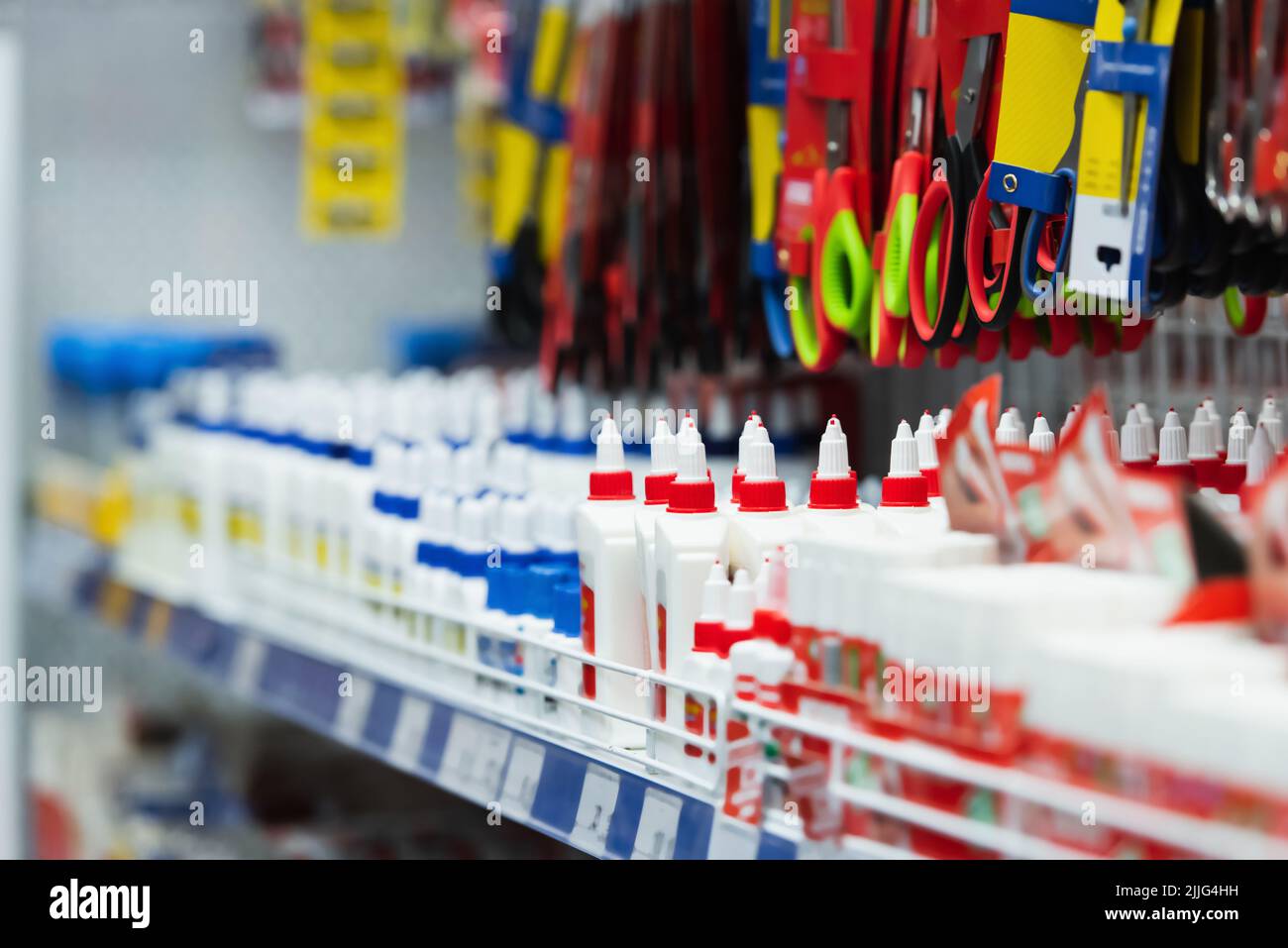 assortment of scissors and glue in stationery shop Stock Photo Alamy