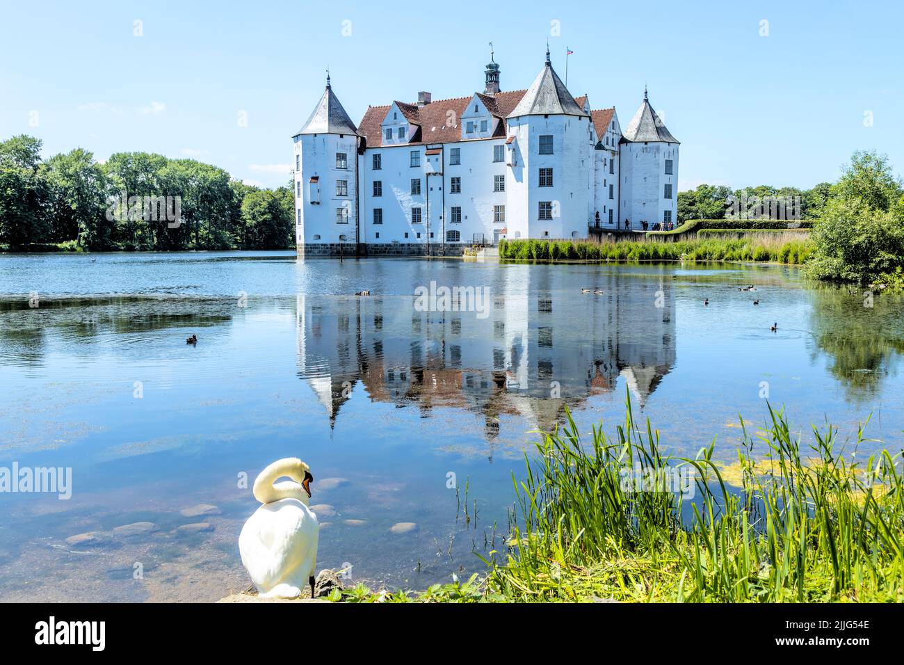 View of Glücksburg Castle. The swan in the foreground makes the scenery romantic. Stock Photo